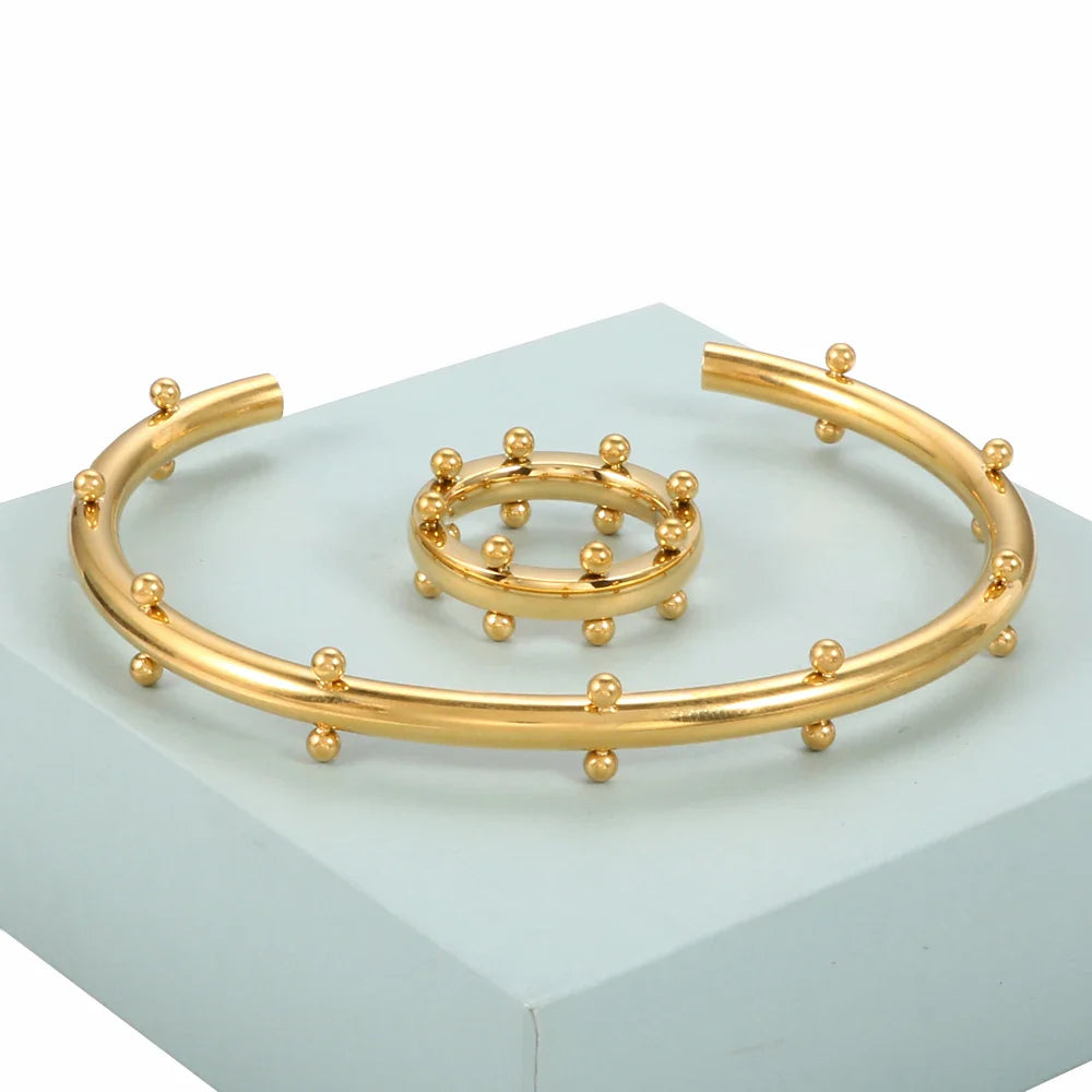 Set di gioielli di lusso Bracciale rigido in acciaio inossidabile Anello da dito Orecchini a cerchio con mini sfere per regali di gioielli di moda da donna