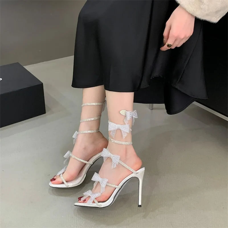Aneikeh Elegant Pink Wedding Shoes CRYSTAL Bow High Heels Sandals Woman Summer Ankle Strap Thin High Heels Open Toed Party Shoes