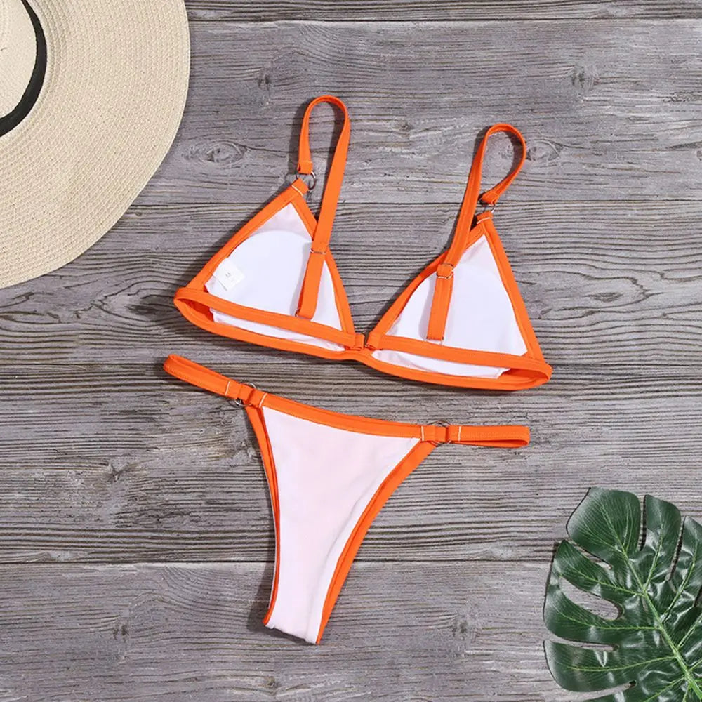 Costume da bagno bikini sexy da donna in tinta unita con fibbia in metallo decorato con costumi da bagno brasiliani per vacanze al mare
