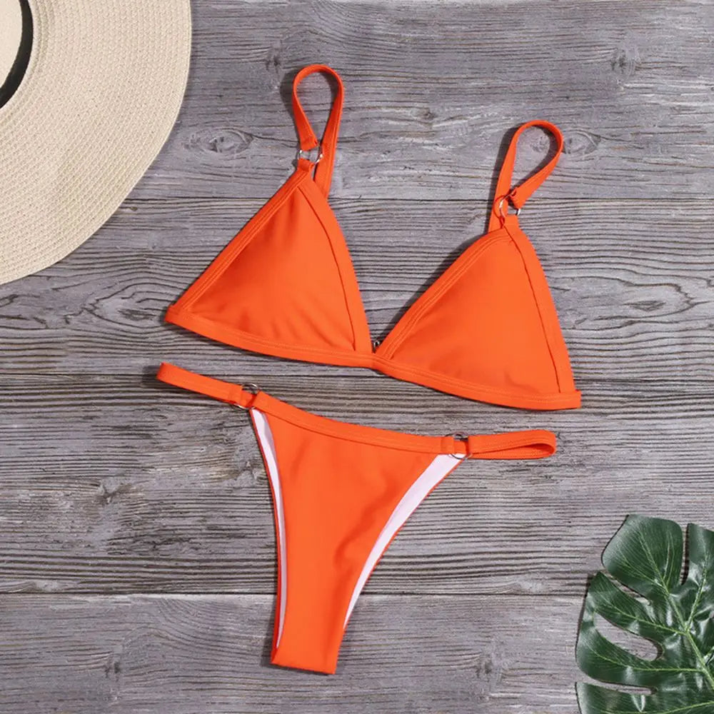 Costume da bagno bikini sexy da donna in tinta unita con fibbia in metallo decorato con costumi da bagno brasiliani per vacanze al mare