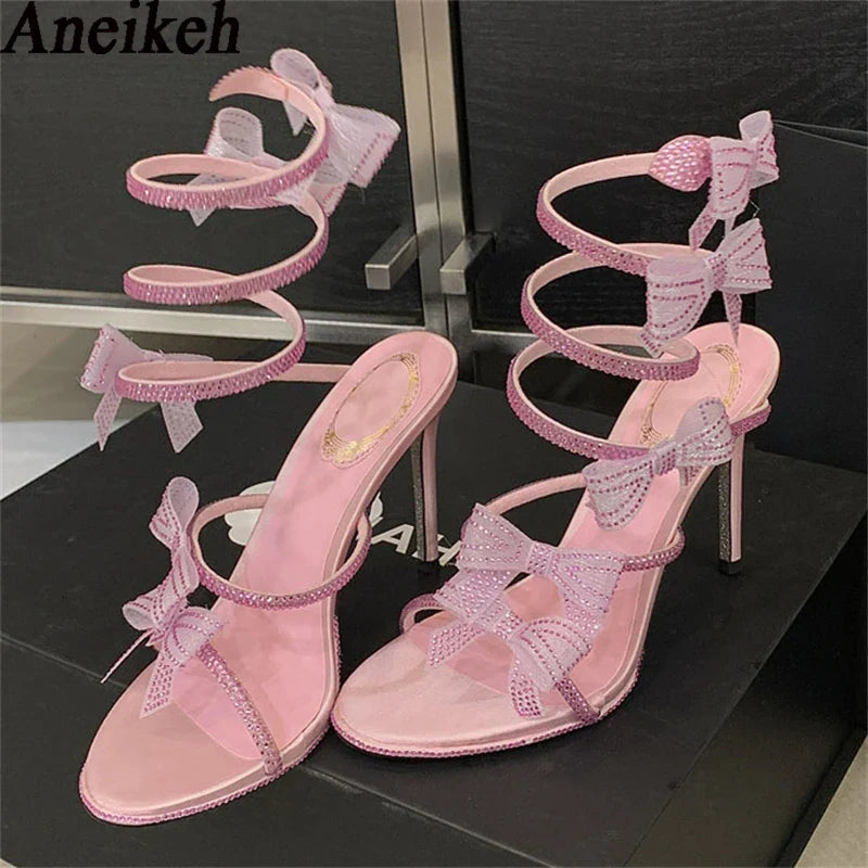 Aneikeh Elegant Pink Wedding Shoes CRYSTAL Bow High Heels Sandals Woman Summer Ankle Strap Thin High Heels Open Toed Party Shoes
